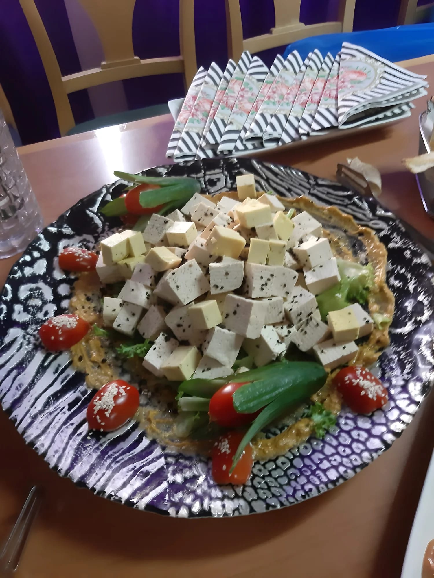 Prepared tofu plate from a Village of Peace community meal